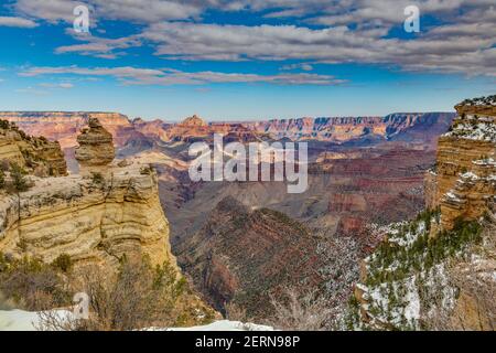 Panoramic view from south cliff of Grand Canyon with dramatic cloud formations in winter Stock Photo