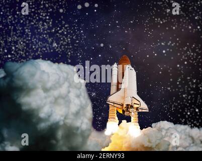 Spaceship takes off into the starry sky. Launch of Space . Elements of this image furnished by NASA