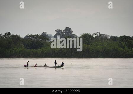 Puerto Triunfo, Colombia. 18th Feb, 2021. Fishermen sail on the Río Magdalena. The hippos that drug lord Pablo Escobar once brought to Colombia have multiplied so much that the country is looking for a solution for the animals. Credit: Luis Bernardo Cano/dpa/Alamy Live News Stock Photo