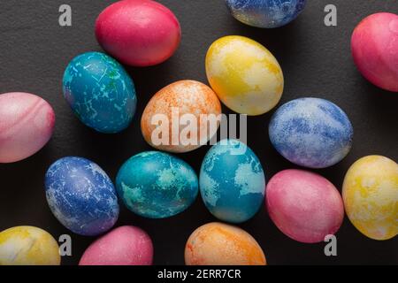 Easter eggs against dark background with copy space Stock Photo