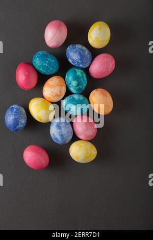Easter eggs against dark background with copy space Stock Photo