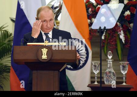 NEW DELHI, INDIA – OCTOBER 5: Russian President Vladimir Putin gestures as he listens the statement made by Indian Prime minister Narendra Modi after signing of agreement ceremony, at Hyderabad House, on October 5, 2018 in New Delhi, India. In a huge boost to its defence forces on Friday, India signed a $5 billion deal for the Russian S-400 Triumf missile shield systems in a key pact at the summit talks between Prime Minister Narendra Modi and President Vladimir Putin, officials said. The agreement was signed in the presence of both the leaders at the 19th India-Russia annual bilateral summit.
