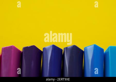 Colorful felt-tip pens on a yellow background. Colorfull concept for creativity. Stock Photo