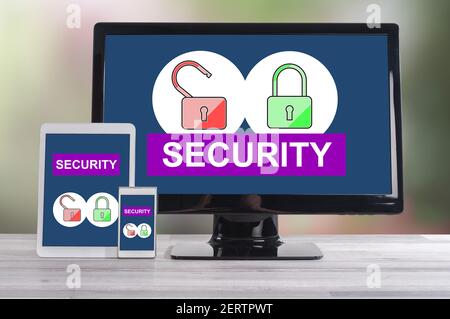 Security concept shown on different information technology devices Stock Photo