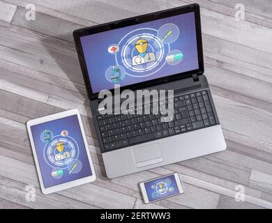 Medical service concept shown on different information technology devices Stock Photo