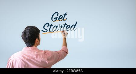 Get Started writing on the wall Stock Photo