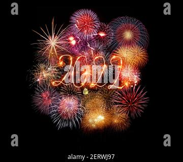 Happy new year greeting card with 2022 golden numbers and fireworks series on dark background with empty space for text Stock Photo