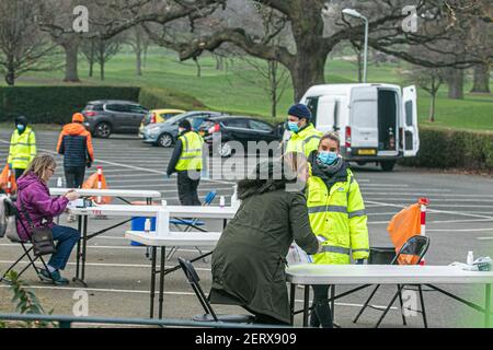 WIMBLEDON  LONDON, UK 01 March 2021. Members of the public using  a covid-19 kit at a testing centre in a car park in Wimbledon. It has been reported that six cases a Brazil coronavirus variant  known as P1 variant was  found in South Gloucestershire and Scotland in February..  Credit amer ghazzal/Alamy Live News Stock Photo