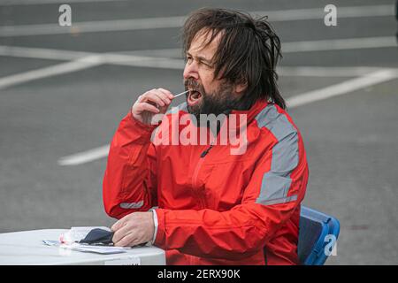 WIMBLEDON  LONDON, UK 01 March 2021. Members of the public using  a covid-19 kit at a testing centre in a car park in Wimbledon. It has been reported that six cases a Brazil coronavirus variant  known as P1 variant was  found in South Gloucestershire and Scotland in February..  Credit amer ghazzal/Alamy Live News Stock Photo