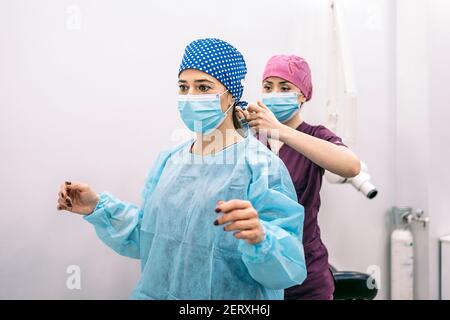 Dental Clinic Worker With Face Mask - a Royalty Free Stock Photo