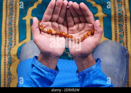 muslim man praying during ramadan, Close up  Stock Photo