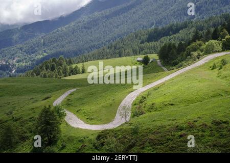 Elevated view of empty road through the mountains Stock Photo