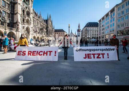 Munich, Bavaria, Germany. 1st Mar, 2021. Ahead of the German Bund-Laender Gespraech (Federation and State Conference) on March 3rd, associations of Hoteliers and the Gastronomy branches organized the Marienplatz silent protest with music and dancing with prepared tables and beds to represent the threats to the existence of these industries. The groups, including Dehoga, are not demanding a reopening at any price, but rather requesting a reliable exit plan for which they may plan. Credit: Sachelle Babbar/ZUMA Wire/Alamy Live News Stock Photo