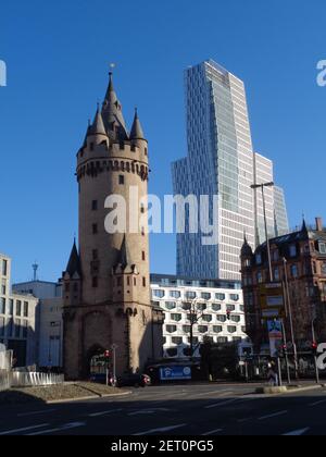 Old meets young. The Eschenheimer tower was built in the 15th century, the tower behind, the Nextower, 2009. More than 500 years of building history. Stock Photo