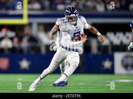 November 05, 2018:.Tennessee Titans quarterback Marcus Mariota (8)  scrambles for a first down during an NFL football game between the Tennessee  Titans and Dallas Cowboys at AT&T Stadium in Arlington, Texas. Manny