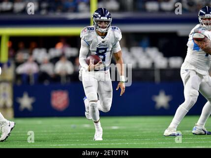 November 05, 2018:.Tennessee Titans quarterback Marcus Mariota (8)  scrambles for a first down during an NFL football game between the Tennessee  Titans and Dallas Cowboys at AT&T Stadium in Arlington, Texas. Manny