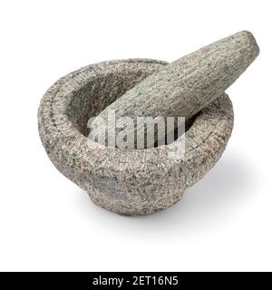 Mortar and pestle of natural stone close up isolated on white background Stock Photo