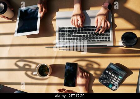 Business people working on devices Stock Photo