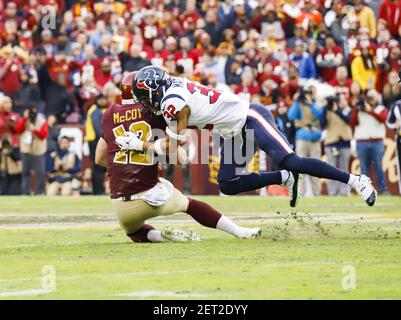 Washington Redskins quarterback Colt McCoy (12) tosses a pass during the  first day of NFL football training camp in Richmond, Va., Thursday, July  25, 2019. (AP Photo/Steve Helber Stock Photo - Alamy