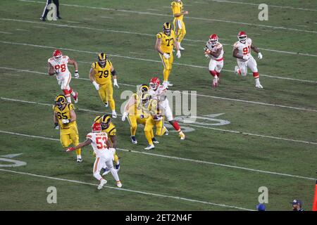 Kansas City Chiefs vs. Las Vegas Raiders. Fans support on NFL Game.  Silhouette of supporters, big screen with two rivals in background Stock  Photo - Alamy