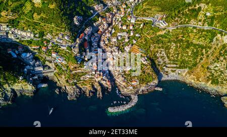 Drone view of the famous Riomaggiore village in Cinque Terre Italy Stock Photo