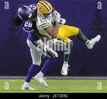 Green Bay Packers' Equanimeous St. Brown runs a drill during an