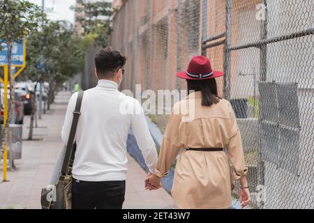 Young couple enjoying a nice afternoon together. Sharing good times enjoying a drink. Stock Photo