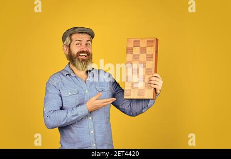 Grandmaster experienced player. Cognitive development. Teacher chess competition. Board game. Bearded man playing chess. Chess figures. Intellectual games. Game strategy concept. Chess lesson. Stock Photo