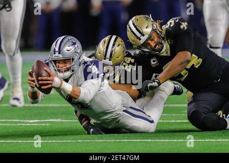 ARLINGTON, TX - DECEMBER 24: FOX sideline reporter Erin Andrews interviews  Dallas Cowboys quarterback Dak Prescott (4) after the game between the  Dallas Cowboys and the Philadelphia Eagles on December 24, 2022