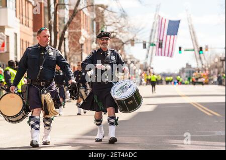 Members of the Boston Police Gaelic Column walking down the street before the 2019 South Boston Saint Patrick's Day Parade. Stock Photo