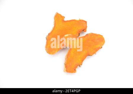 Two slices o turmeric isolated on white background. Stock Photo