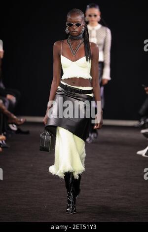 Model Anok Yai walks on the runway during the Alexander Wang Pre-Fall
