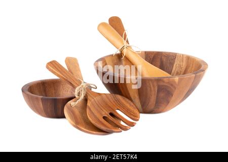 Wooden bowls, spoons and fork, isolated on white background. Stock Photo