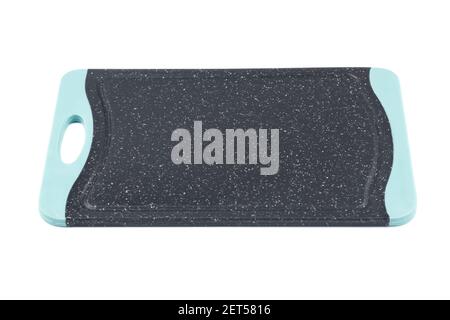 Black plastic cutting board isolated on white background. Stock Photo