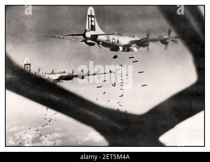 WW2 B-29 bombers on a bombing run over Hiratsuka Japan viewed through from bomb aiming nose cone window July 16, 1945 view of two 39th Bomb Group B-29s out of North Field (Andersen) on a mission over Japan. World War II Second World War Pacific War Stock Photo