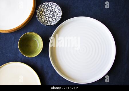 The empty bowls and plates on the table, dishware, and tableware Stock Photo