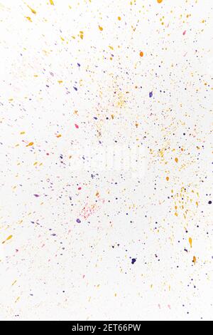 Colored drops of paint on white paper. Background for stories Stock Photo