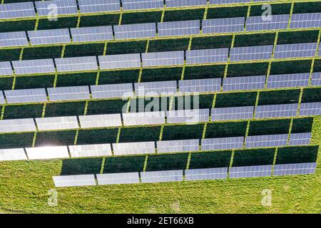 Aerial view of Solar farm with large solar panels in an array, West Sussex, England Stock Photo