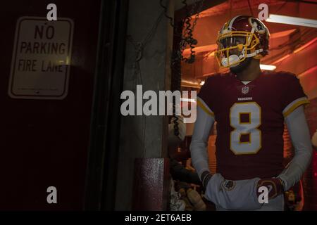 Washington Redskins quarterback Mark Sanchez (6) looks for a receiver in  first quarter action during the game against the New York Giants at FedEx  Field in Landover, Maryland on Sunday, December 9