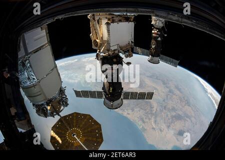 3 spaceships, 1 USA, 2 Russian. from the United States and two from Russia, attached to ISS. L-R: Northrop Grumman Cygnus space freighter, Soyuz MS-17 Stock Photo