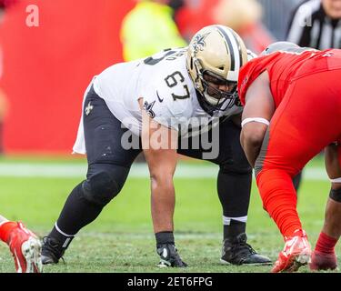 Tampa, Florida, USA. 09th Dec, 2018. New Orleans Saints offensive guard  Andrus Peat (75), New Orleans Saints center Max Unger (60) and New Orleans  Saints offensive guard Larry Warford (67) during the