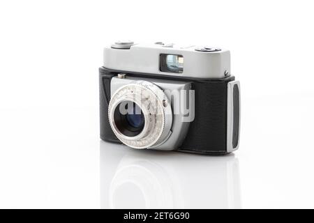 Old-time rusty photo-camera on white background Stock Photo