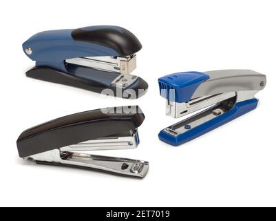 Top view of three staplers isolated on white background. Stock Photo