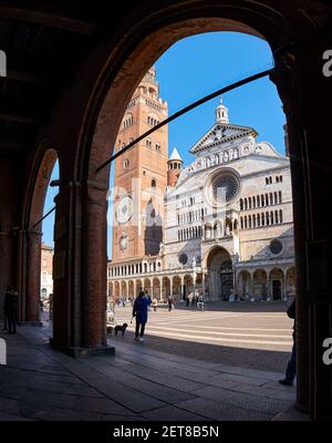 Ancient Cathedral of Cremona with famous Torrazzo bell tower at beautiful market square Piazza Duomo in Cremona, Lombardy, Italy Stock Photo