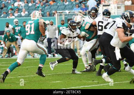 December 23, 2018: Cameron Wake #91 of Miami is introduced before the NFL  football game between the Miami Dolphins and Jacksonville Jaguars at Hard  Rock Stadium in Miami Gardens FL. The Jaguars