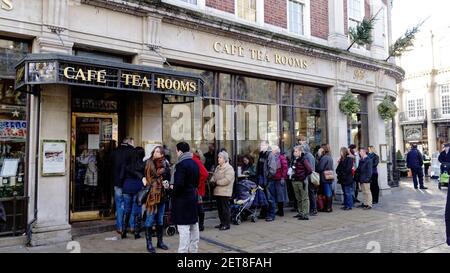 A long queue of people outside Betty's Tea Rooms in York, England Stock Photo