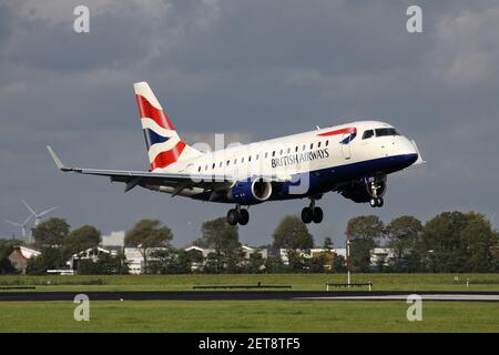 BA CityFlyer Embraer ERJ-175 with registration G-LCYD short final for runway 18R (Polderbaan) of Amsterdam Airport Schiphol. Stock Photo