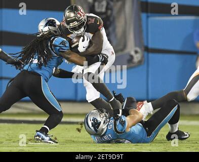 Tampa Bay Buccaneers David Boston wide receiver watches a replay