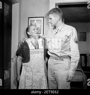 Sergeant George Camblair and his mother while at Home on Weekend Furlough, Washington, D.C., USA, Jack Delano, U.S. Office of War Information, September 1942