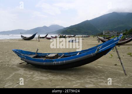 Traditional hand made reed boat for fishing in small town Lang Co on the central coast of Vietnam Stock Photo